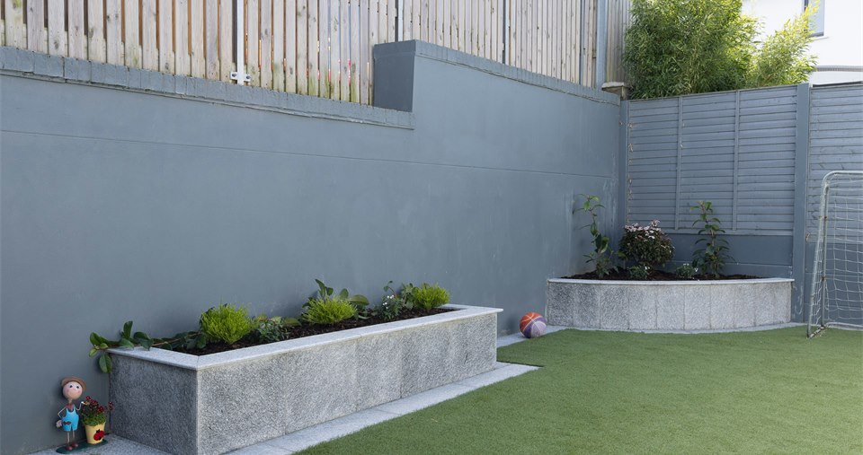 Artificial grass garden installation by Mighty Contractors